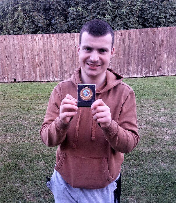 ASC Josh with his medal