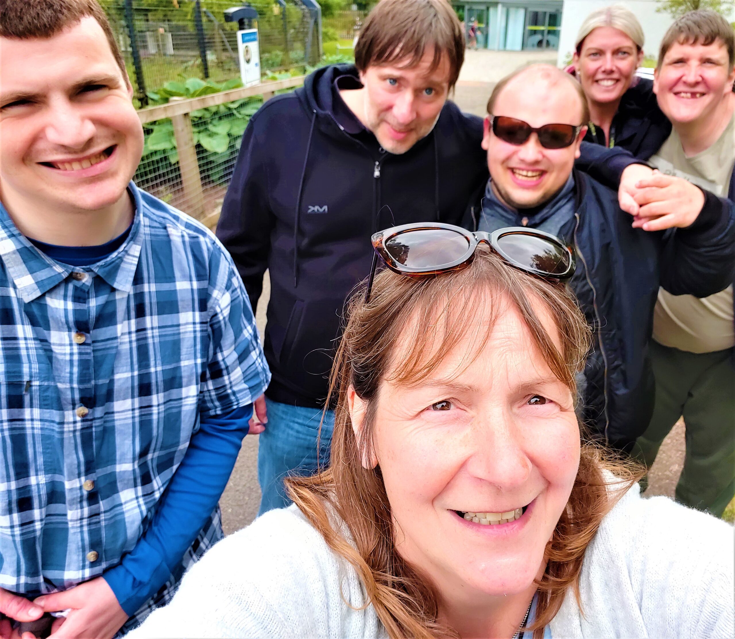 service users and staff selfie at the zoo